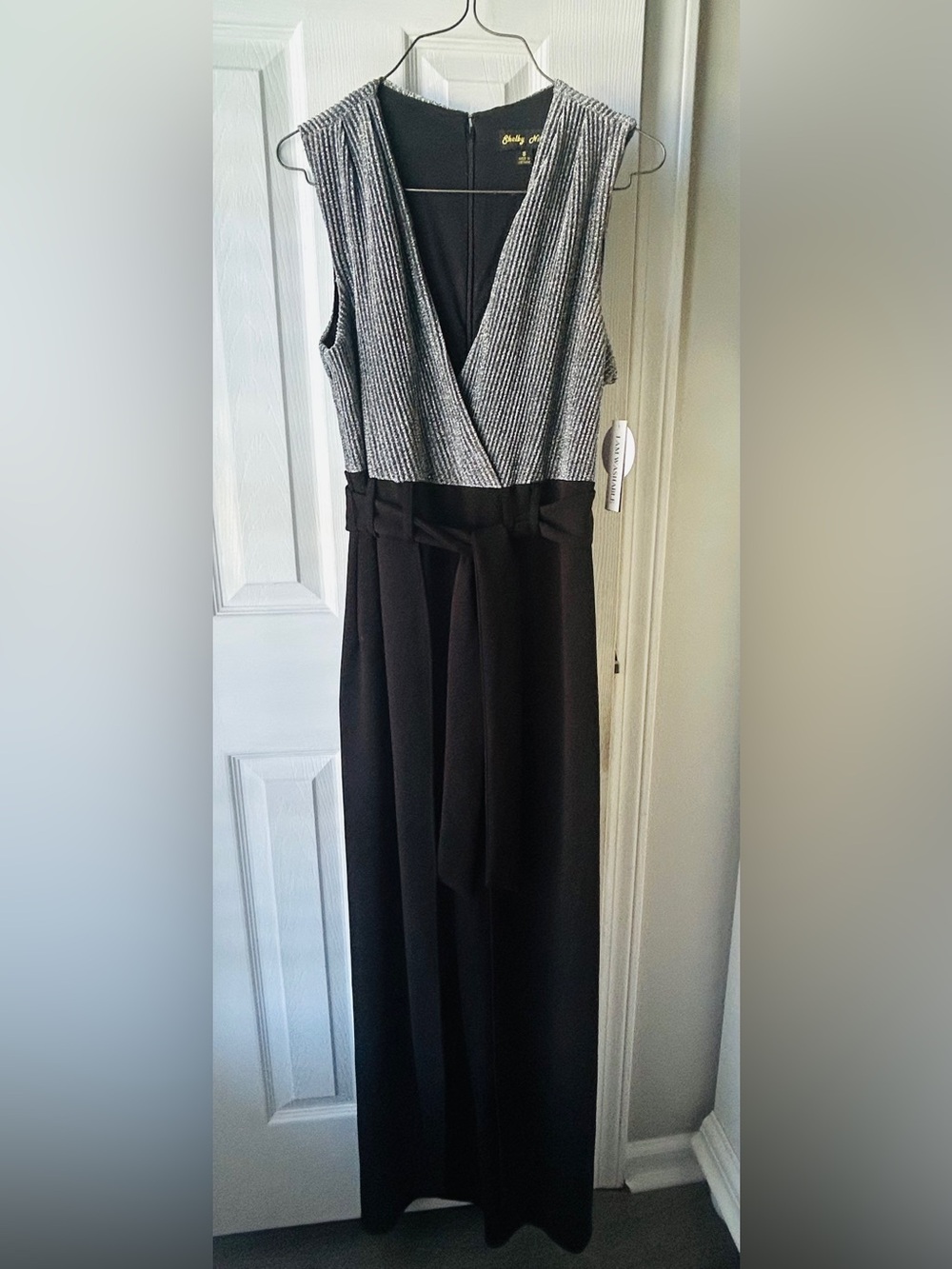 Sleeveless Black and silver jumpsuit in woman’s small NWT
